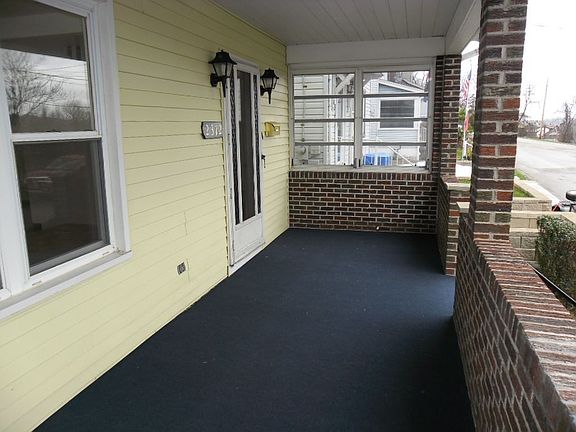 Front carpeted porch