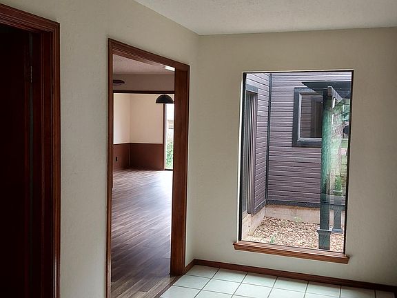 Entry with view of courtyard Pergola.