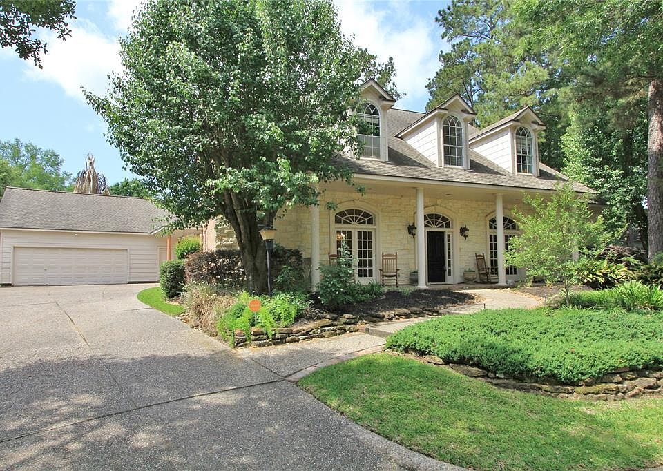 Picturesque Five Bedroom Home is nestled at the end of a cul-de-sac with high elevation and mature landscaping.