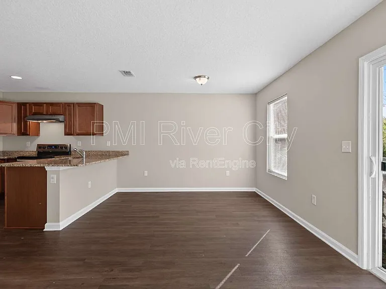 7608 Rain Forest Dr N — Photo 7