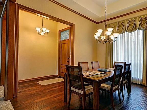 Dining has recent wood floor & fixtures