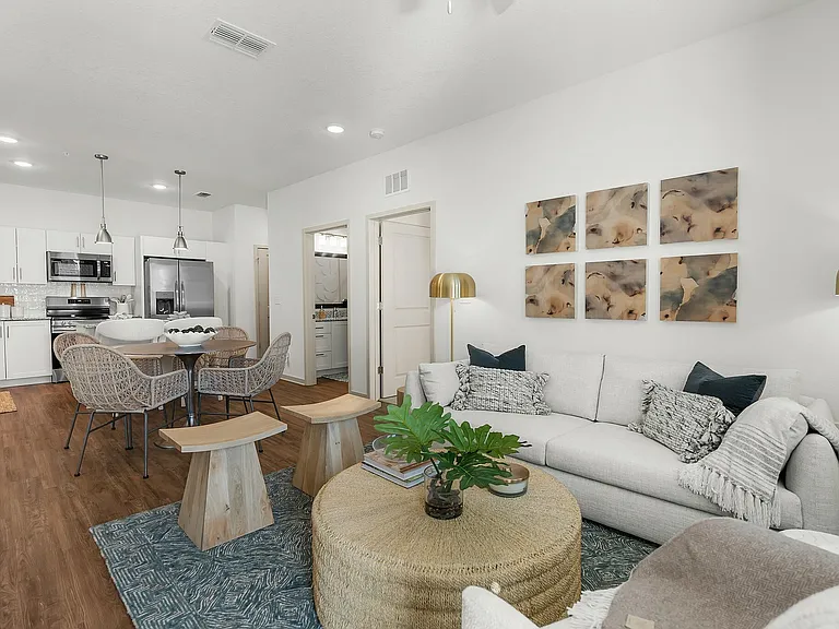 Experience the elegance of this open-plan living space, designed for modern comfort.