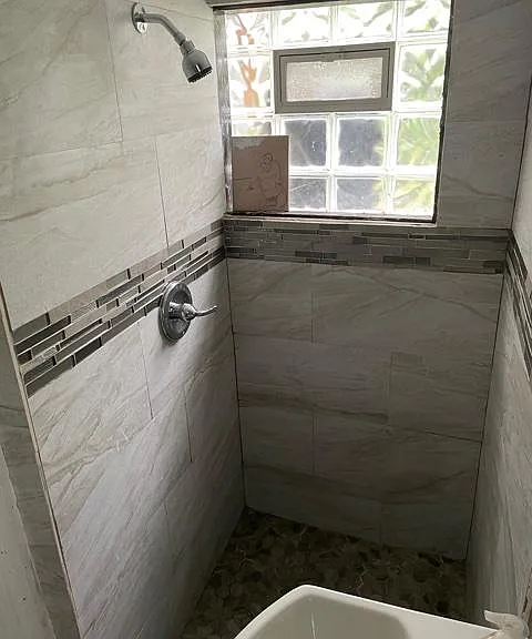 Basement shower space. Suitable for people, perfect for pets.