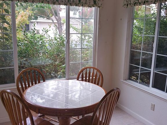Breakfast nook with table and chairs