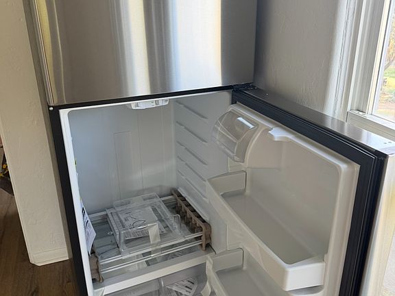 New stainless steel fridge/freezer