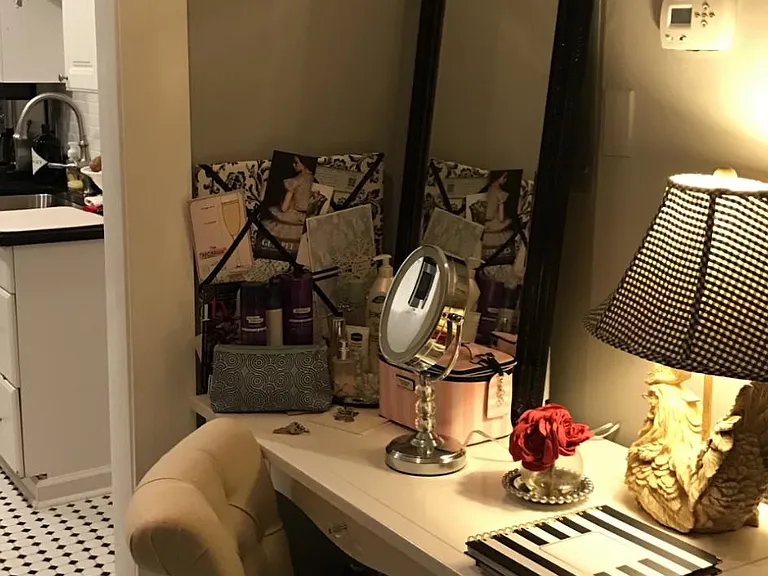 Bonus space in back can be used as a make-up room or office/library.