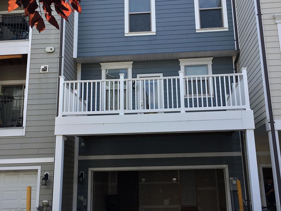 2 Garage, 2 car parking pad, and large private deck