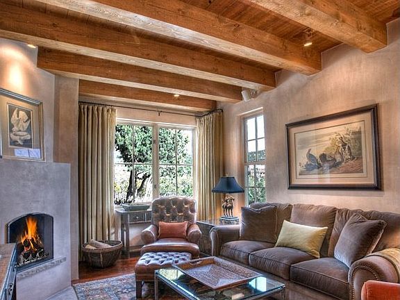 Study: A handsome handcrafted door opens to reveal the calm, relaxing study. A feeling of warmth, co