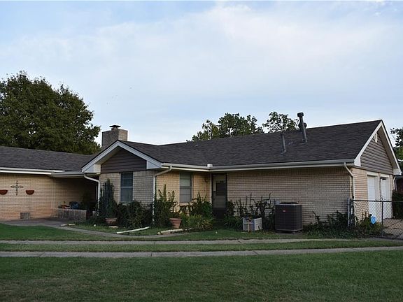 Concrete tracks into the backyard from the driveway- great to park a boat or RV.