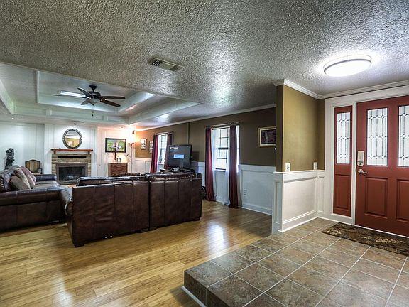 Family room is 19'x29', with wood burning fireplace