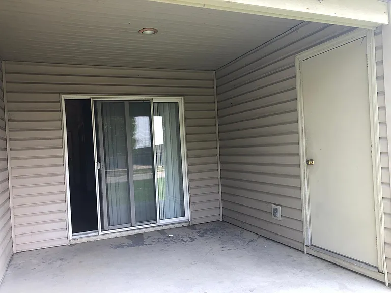 Back patio with small storage area