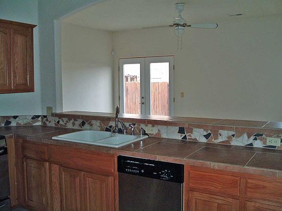 Mosaic tile accents throughout