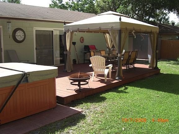 Spa and Gazebo in backyard