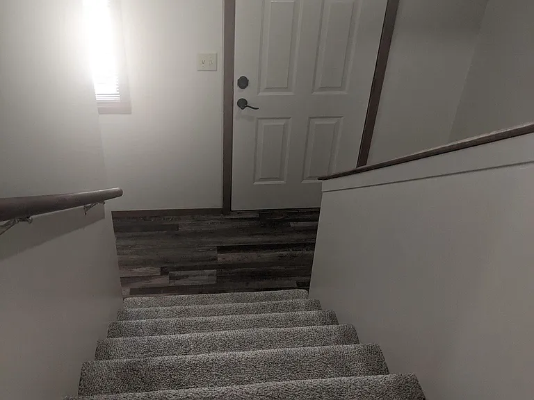 Looking down from upstairs to entry
