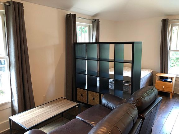 Reclining loveseat and coffee table can remain if desired.