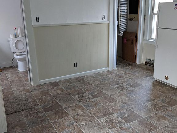 New Kitchen with Bathroom and laundry room.