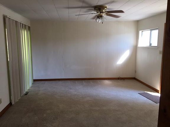 Large living room with lots of natural light.