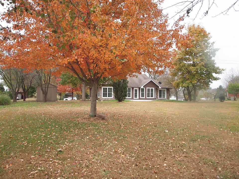 Large tree-shaded back yard