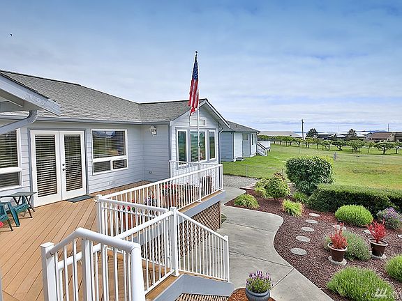 Lots of deck space to enjoy the outdoors and views!  The orchard adjacent to the next door neighbor's house is a delight to see and provides a view buffer for the neighbors that everyone enjoys!