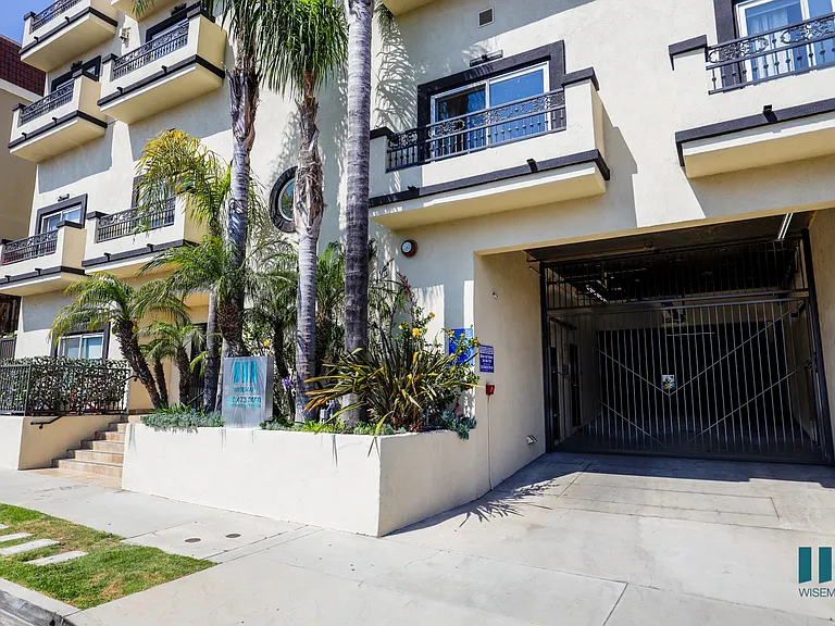 Front Entrance of Building and Resident Garage