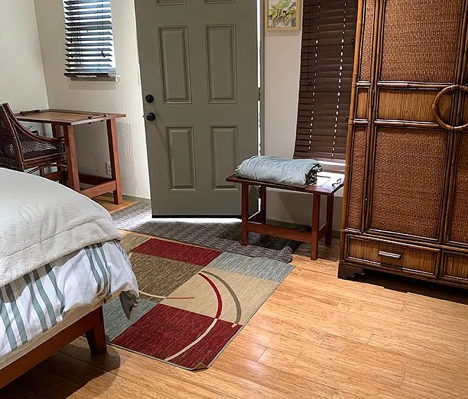 3rd bedroom with private entrance and door into steam room bathroom