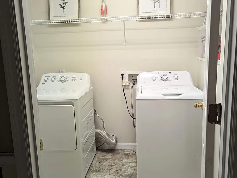 Shared laundry room on the lower level.