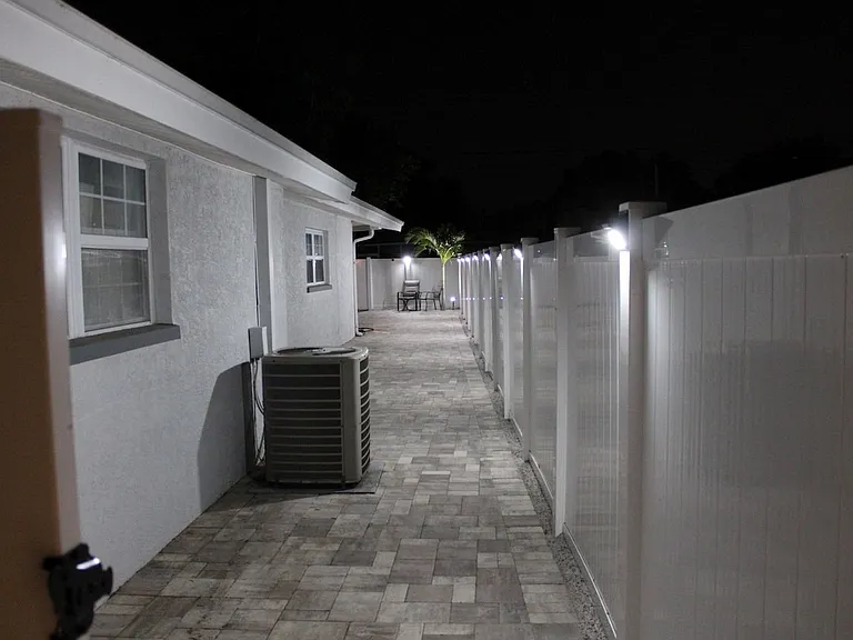 PVC privacy fencing surround the home.