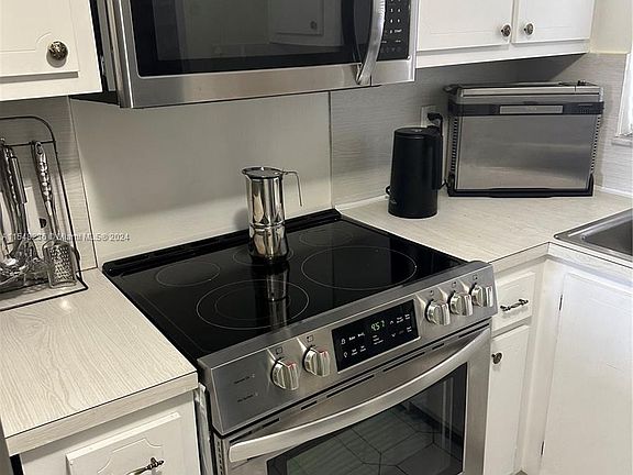 2nd image of 9001 Sunrise Lakes Blvd APT 309