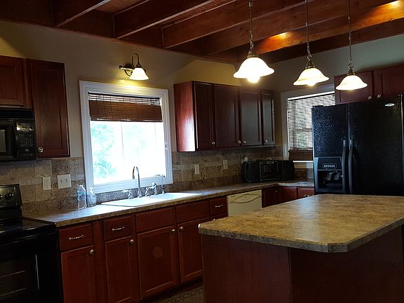 Roomy kitchen with island.