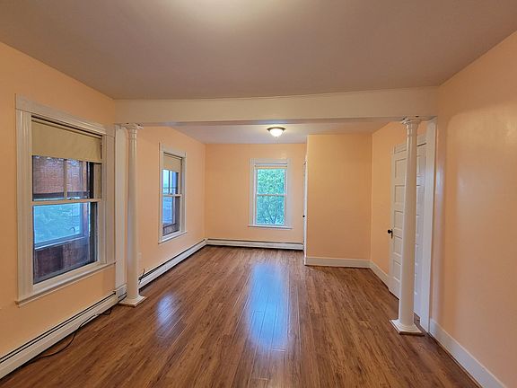 very large peach bedroom view 1
