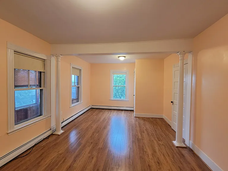 very large peach bedroom view 1