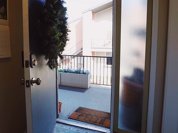 Front door with Entry Balcony