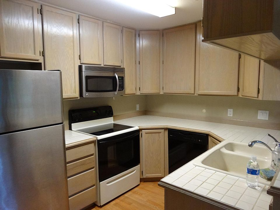 Kitchen with a lot of cabinets.