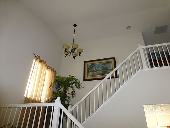 From front door, banisters and stairs
