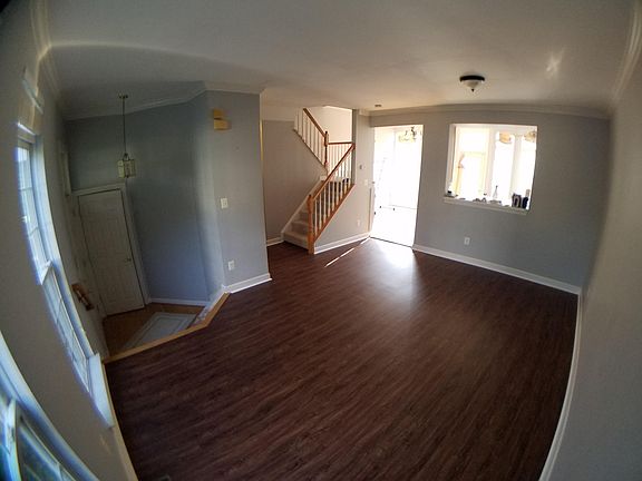 Livingroom, Foyer, and window & access to kitchen