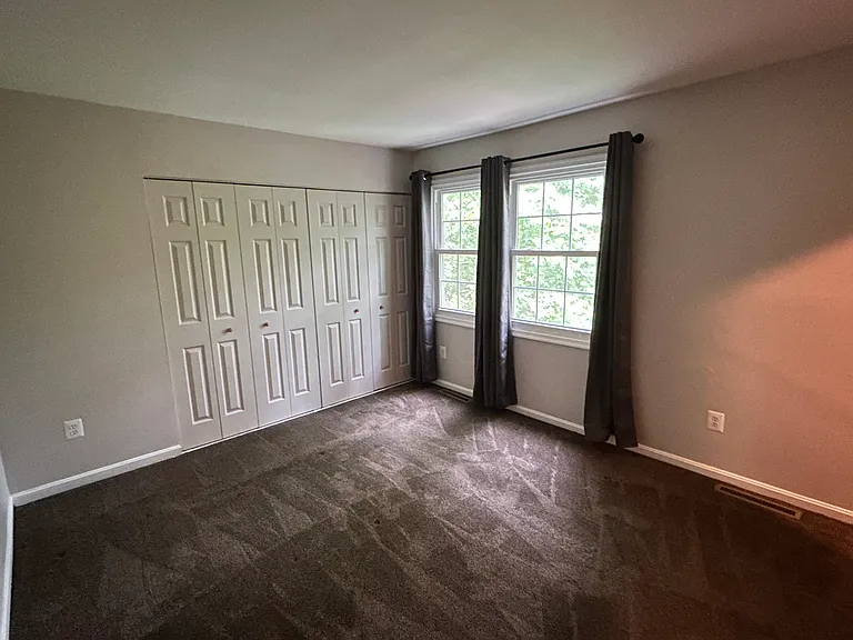 Owner's bedroom with 3 closets.