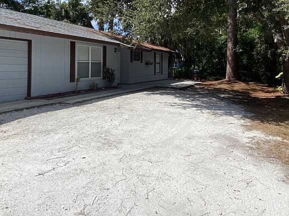 Front of house and parking.