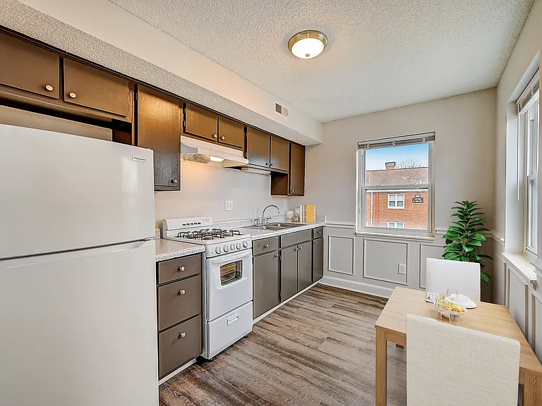 Recently Renovated Townhouse Style Apartments featuring New gray carpet, Neutral paint scheme, Premium hardwood-style flooring, Neutral paint scheme, Upgraded light fixtures, New cabinets, Matching stainless steel appliances, Washer/Dryer, Air conditionin