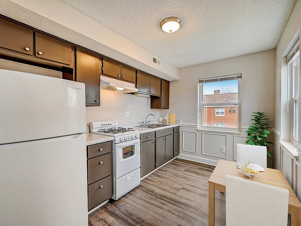 Recently Renovated Townhouse Style Apartments featuring New gray carpet, Neutral paint scheme, Premium hardwood-style flooring, Neutral paint scheme, Upgraded light fixtures, New cabinets, Matching stainless steel appliances, Washer/Dryer, Air conditionin