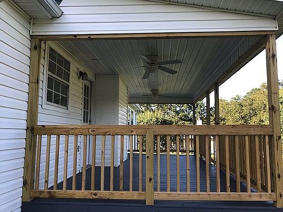 Back porch with 2 fans