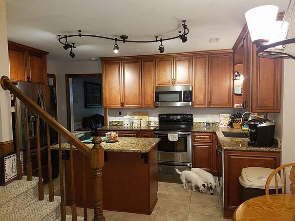 Kitchen with an eat in area 
and pantry