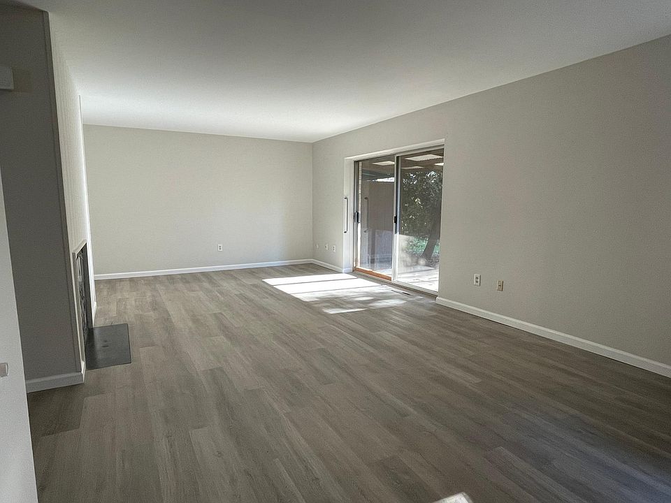 large living room with outdoor back porch
