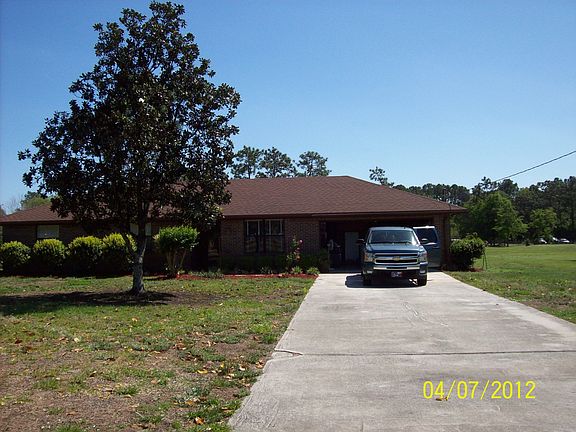 Front of home, plenty of parking.