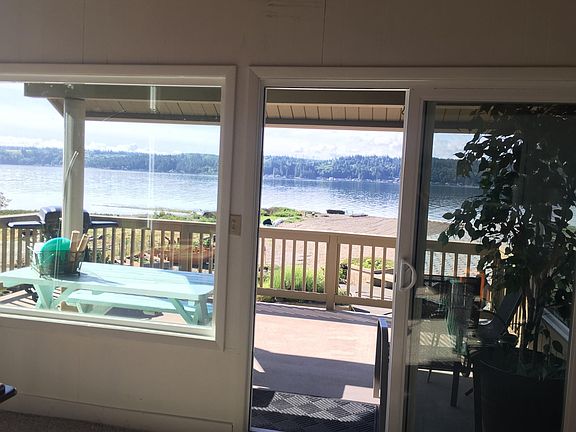 Looking out the front windows and sliding glass door.