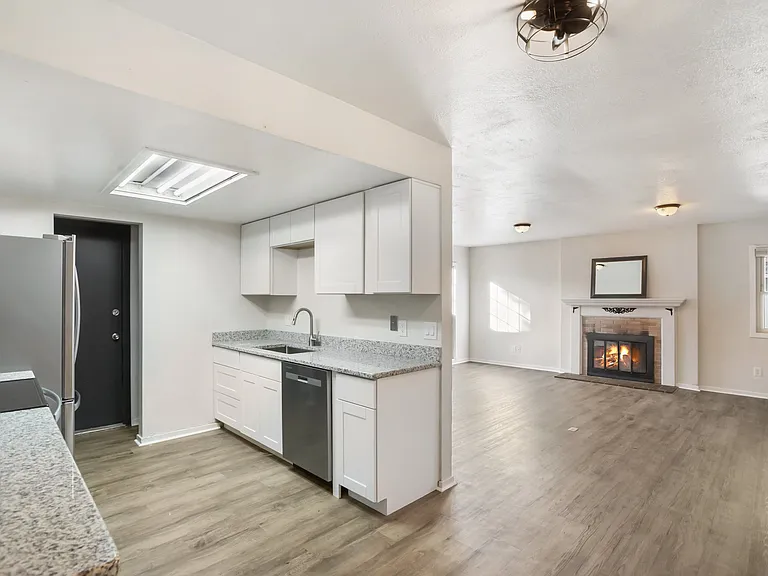 Updated Kitchen access to the 1 car garage. Pantry between kitchen and garage