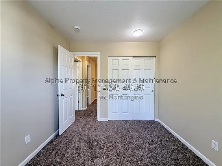 5758 NE Damsel Dr — Photo 22