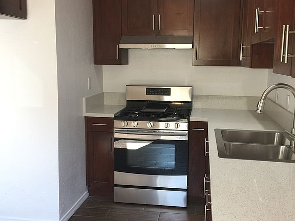 Remodeled kitchen with quartz counter top