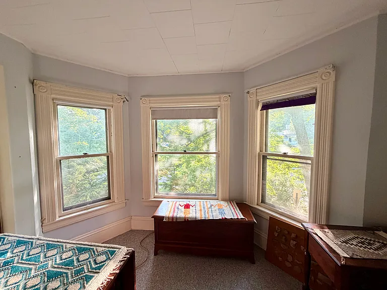 Upstairs front bedroom bay windows.