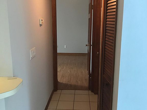 Hallway to primary bedroom