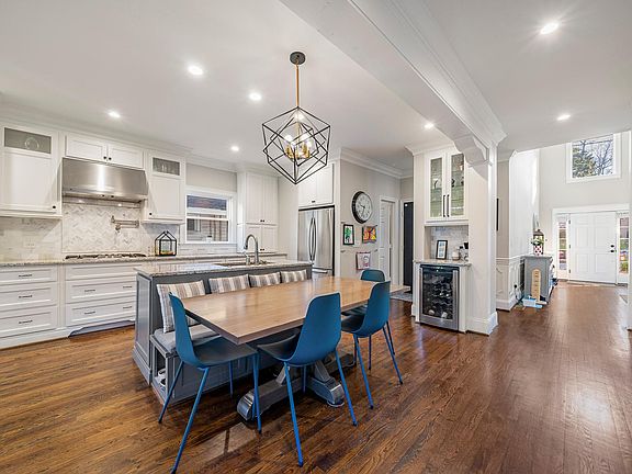 kitchen, wine fridge, eat in area